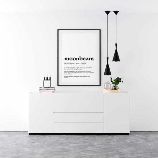 An art print presenting the word "moonbeam," defined as "A soft, glowing line of light streaming down from the moon, illuminating the night." The poetic description calls it "nature’s nightlight for romantic souls and nocturnal cats."